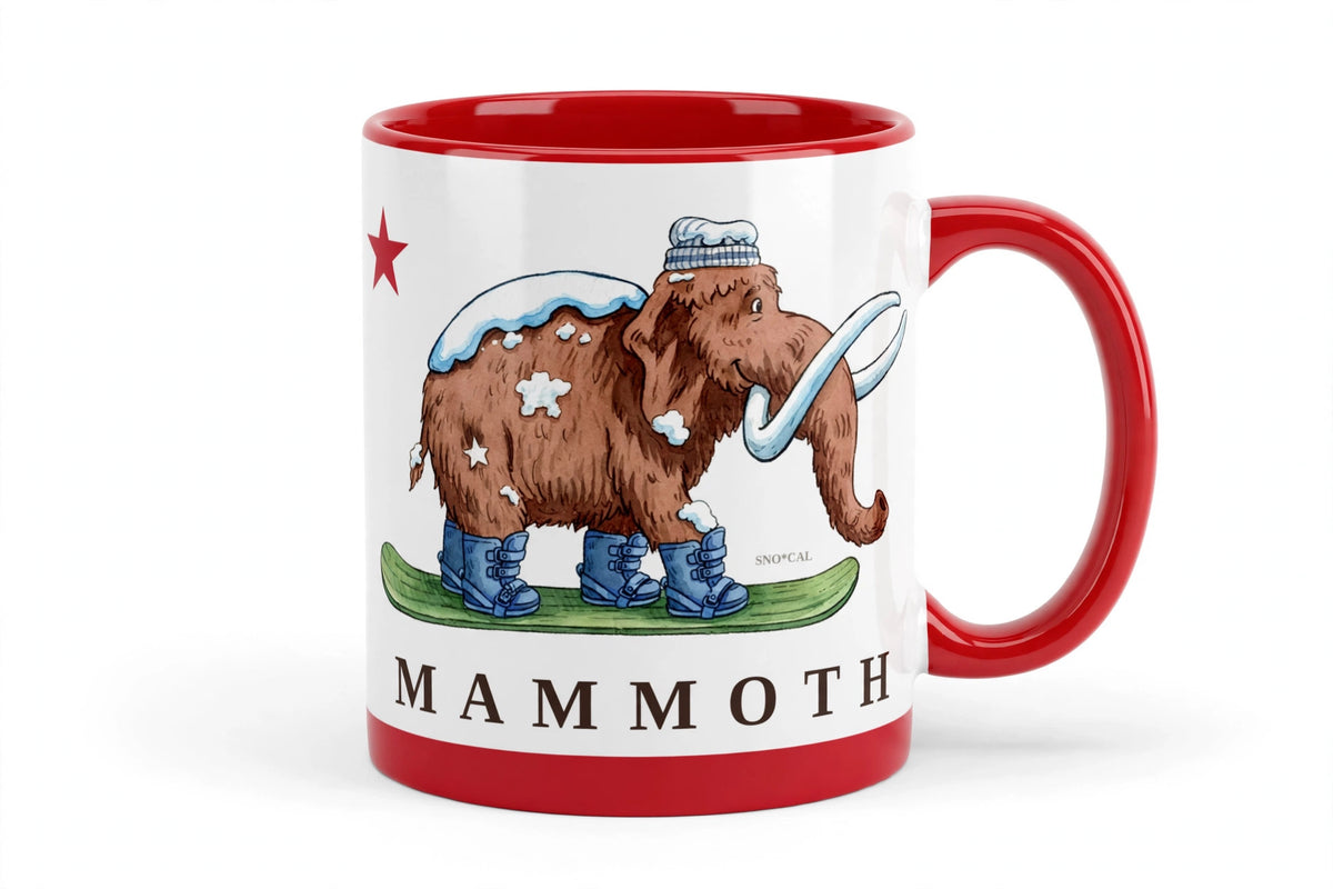 White ceramic mug with red rim handle and inside with Mammoth CA flag design, woolly mammoth snowboarding, front view